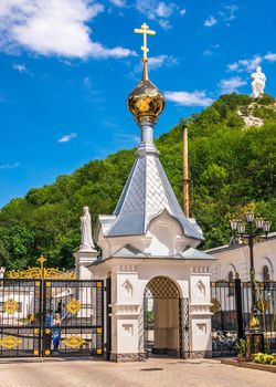 Svyatogorsk, Ukraine 07.16.2020.  The main entrance to territory of the Svyatogorsk Lavra  in Ukraine, on a sunny summer morning