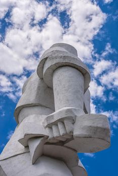 Svyatogorsk, Ukraine 07.16.2020.  Monument to Artem on the mountain above the Svyatogorsk or Sviatohirsk lavra on a sunny summer day