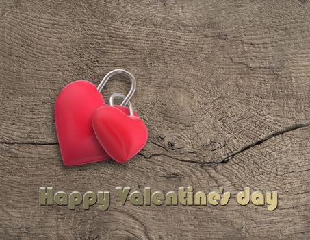 Two hearts locked together on wooden background. Symbol of love, couple, marriage, wedding, dating. Text Happy Valentines day