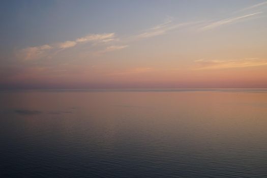 Delicious delicate sunset over a calm sea