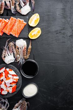 Asian snack surimi set, on black background, top view flat lay , with copyspace and space for text