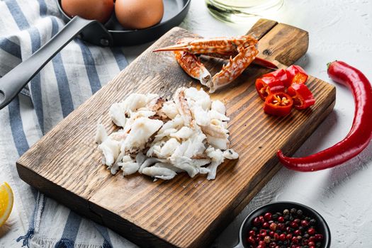 Ingredients for breakfast omelette with crab meat and cheese set, on white background