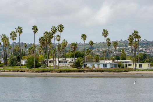 Caravan and home trailer park area next the water in the De Anza Cove in Mission Bay area in San Diego, California, USA. April, 22nd, 2020