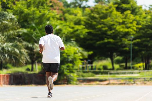 Asian young lifestyle athlete sport runner black man wear feet shoe active running training at the outdoor on the treadmill line road, healthy exercise workout