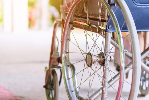 Closeuo empty wheelchairs in the hospital parked waiting for physical patient services, medical care concept