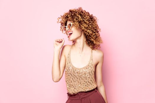 Woman portrait Curly hair smile sunglasses fashion studio charm isolated background
