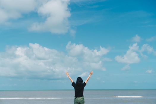 Woman travel around the world with summer beach freedom and relax life concept.