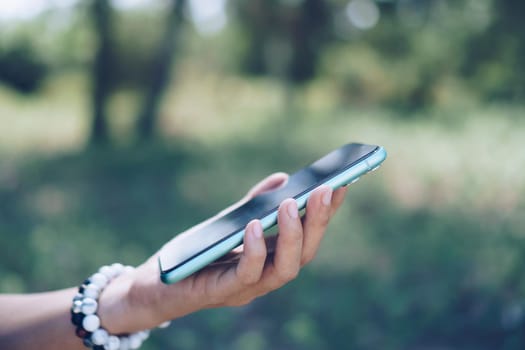 Woman hand using smartphone to do work business, social network, communication concept.