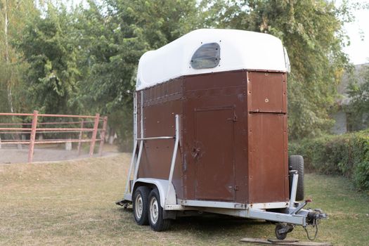 Horse trailer standing outdoor . vehicle for horse transportation Travel with animals