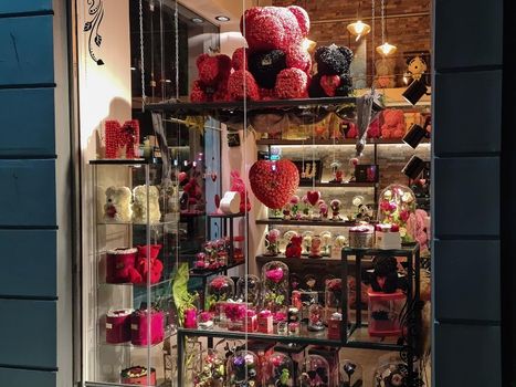 Illuminated night view of toy flower shaped love bears, hearts and gifts for the annual February 14 feast inThessaloniki, Greece.