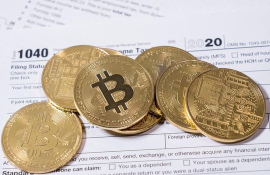 Form 1040 for 2020 with bitcoin coins for reporting of gains from cyber currency trading or investment