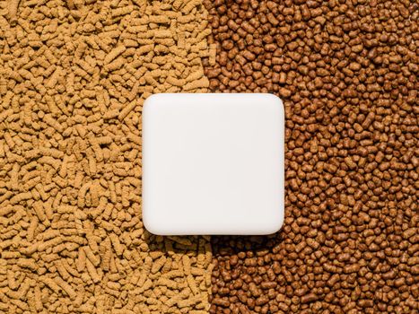 Buckwheat tea or kuqiaocha background with copy space. Top view of two types of soba tea groats - light and dark roast. Flat lay. Copy space in center