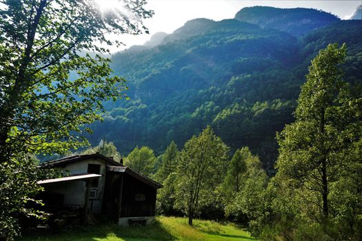 Old house at the bottom of a mountain spotted in the Valle Verzasca, Switzerland