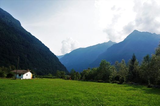 Farm house with plain meadow in Gerra, Verzasca Valley, Ticino, Switzerland