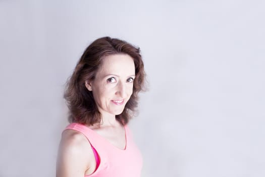 Portrait of woman with happy and positive expression. Copy space.