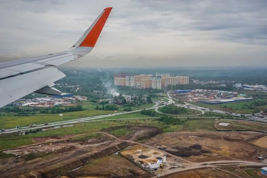 Top view of the city from the height of an airplane