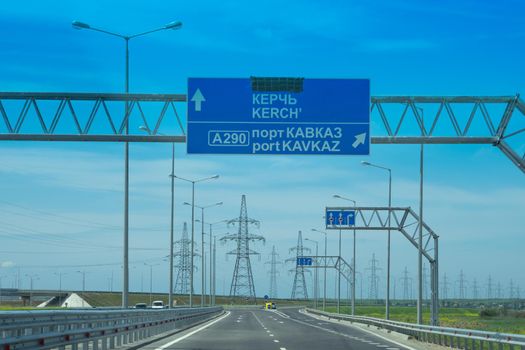 Taman, Russia. Landscape with a road and signs.