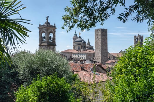 Upper town. Bergamo, Italy. Landscape at the city center, the old towers and the clock towers from the ancient fortress. Bergamo, ITALY - August 19, 2020.