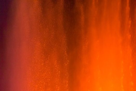 Abstract background of water drops in neon lighting. For design and networking.