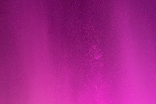 Abstract background of water drops in neon lighting. For design and networking.