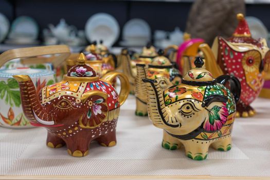 Beautiful colorful dishes in the form of animals and birds.