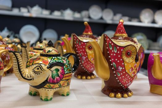 Beautiful colorful dishes in the form of animals and birds.