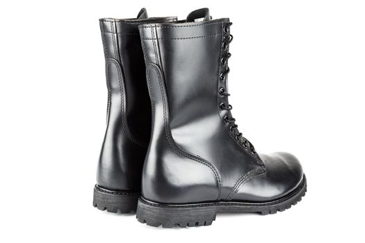 three quarter back view on pair of black leather 10-inch new black military combat lug sole ankle jump boots, isolated on white background