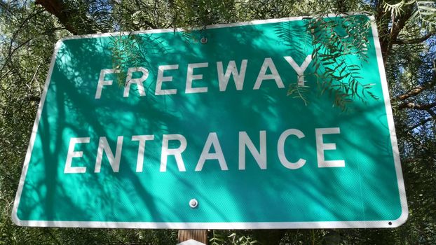 Freeway entrance sign on interchange crossraod in San Diego county, California USA. State Route highway 78 signpost plate. Symbol of road trip, transportation and traffic safety rules and regulations.