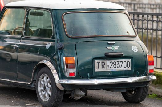terni,italy february 11 2021:mini cooper vintage in green color