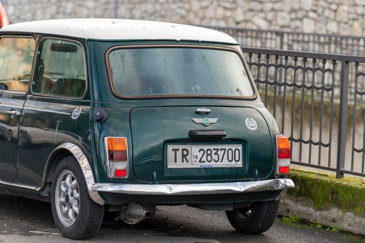 terni,italy february 11 2021:mini cooper vintage in green color