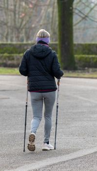 terni,italy february 11 2021:woman doing sports at the park with grappling hooks