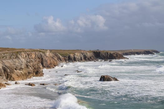 Natural cliffs on beautiful and famous coastline Cote Sauvage on peninsula Quiberon, Brittany, France