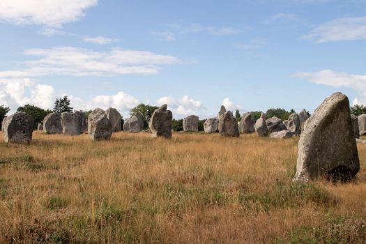 Alignments of Kermario, rows of standing stones - menhirs, the largest megalithic site in the world, Carnac, Brittany, France