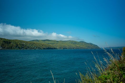 Natural background with a view of lake Baikal. Listvyanka, Irkutsk region