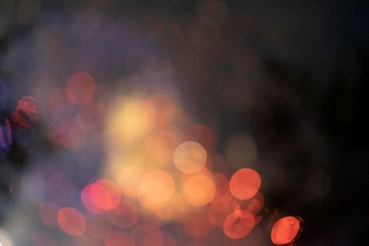 Abstract blurry background with bokeh fireworks.