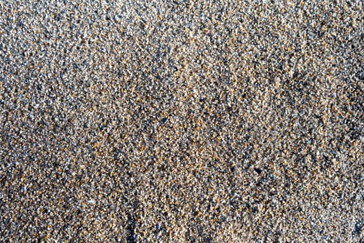 Natural background of multicolored coarse sand.