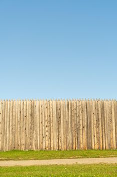 Wooden fence against the blue sky. For design and network