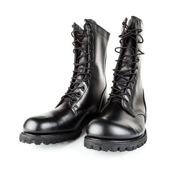three quarter front view on pair of black leather 10-inch new black military combat lug sole ankle jump boots, isolated on white background