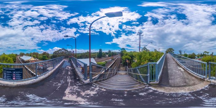 Spherical 360 panorama photograph of the commuter carpark bridge at the Valley Heights Train Station in The Blue Mountains in regional New South Wales in Australia