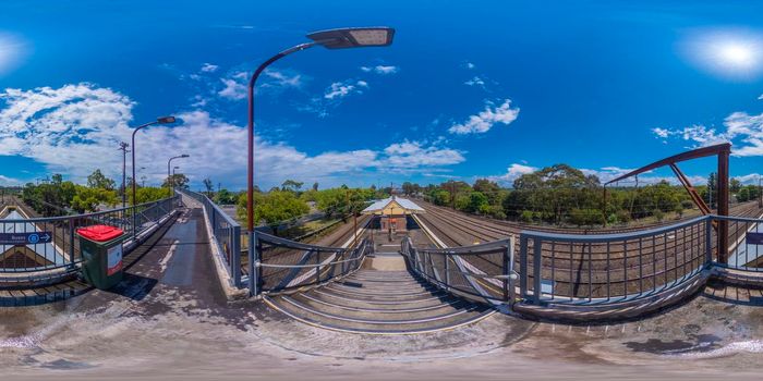 Spherical 360 panorama photograph of the commuter carpark bridge at the Valley Heights Train Station in The Blue Mountains in regional New South Wales in Australia