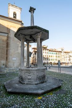 Udine, Italy. February 11, 2020. Lanterna di Diogene (the Diogene lantern) ancient well in St. James square