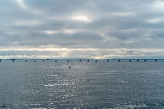 Seascape with a view of the sedan De Vries bridge. Vladivostok, Russia