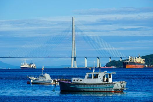 Vladivostok, Russia.Seascape overlooking the Russian bridge and ships.