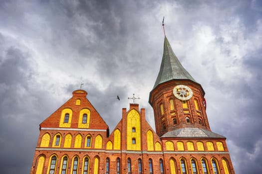 The sight of the city Cathedral on the background of cloudy sky