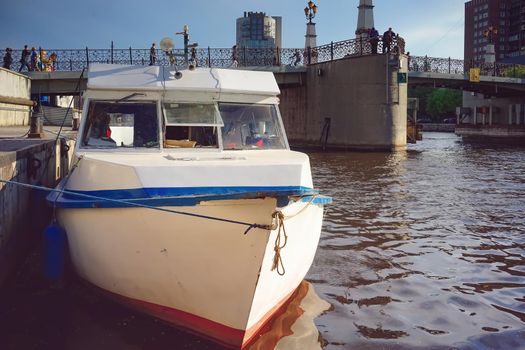 Kaliningrad, Russia. Water transport on the background of the river Pregol.