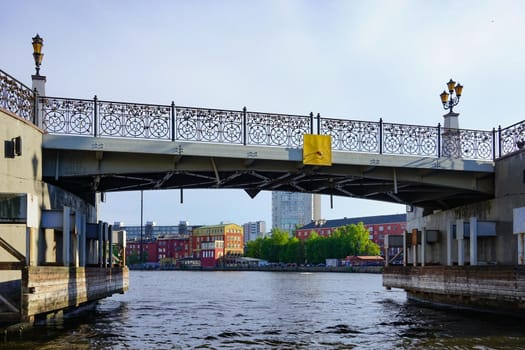 Kaliningrad, Russia. Cityscape with view of the river Pregolya, bridge and modern buildings.