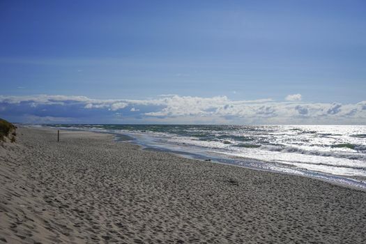 Deserted seascape on the Baltic sea and sand dunes