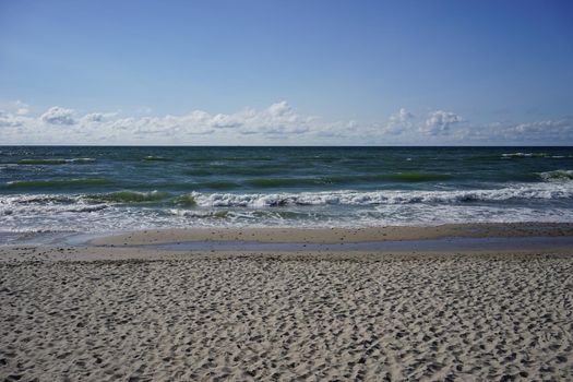 Deserted seascape on the Baltic sea and sand dunes