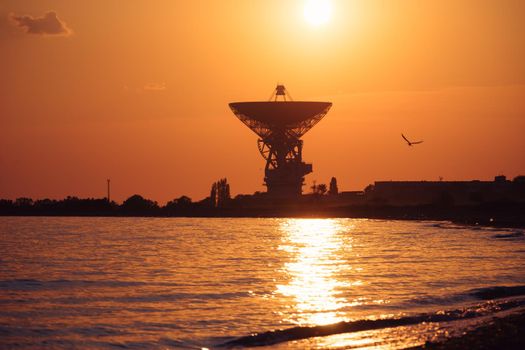 Radio telescope R-2500 RT-70 on the background of a beautiful sunset. Evpatoria, Crimea