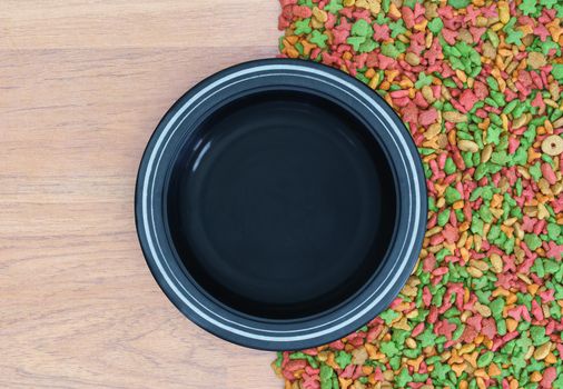 Top view dry food for cat and dog with empty bowl